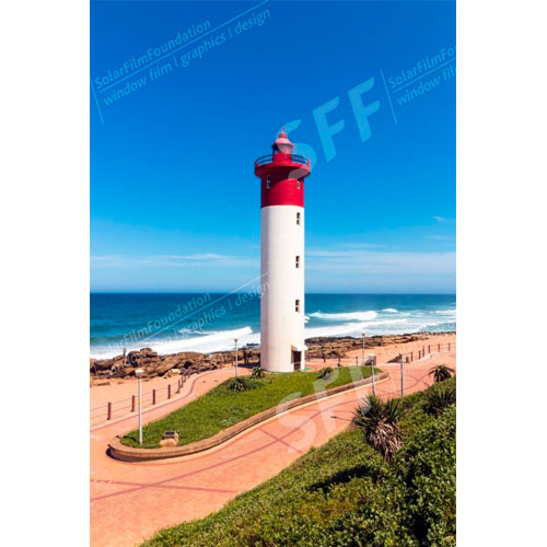 Red and white lighthouse Umhlanga beach in Durban, South Africa